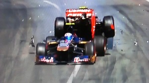 Romain Grosjean, Lotus climbs into the Torro Rosso of Daniel Di Ricciardo.